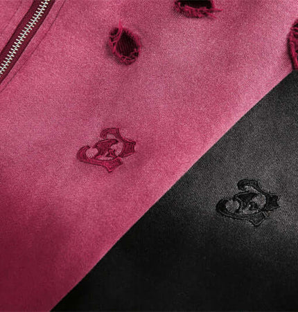 Half-Zip Printed Hoodie – Loose Fit in maroon and black showing vintage design details and distressed fabric.