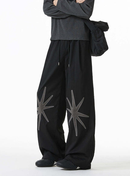 Black patterned technical trousers with Grozavu logo