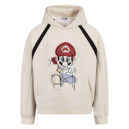 Retro Cartoon Patchwork Hoodie – Loose Fit featuring playful cartoon graphics with a loose fit design and soft fabric.