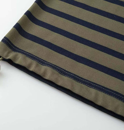 Close-up of the Striped Lapel Polo Shirt showing the olive and navy stripe pattern and zipper detail.