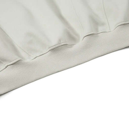 Color-Block Hooded Jacket – Loose Fit hem detail showing soft, breathable fabric for comfort and style.