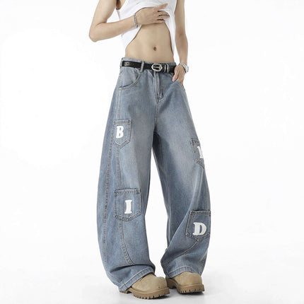 Knife-Cut Cargo Pants – Loose Fit featuring a unique wide-leg design and bold lettering on a distressed finish.