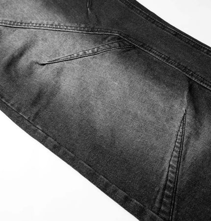 Distressed Pleated Reverse Denim Pants showcasing pleated panels and washed finish for an edgy street style.