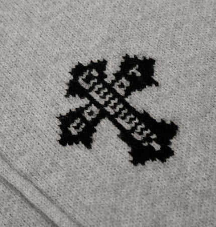 Close-up of Letter Jacquard Knit Hoodie – Loose Fit showing the intricate black pattern on soft gray fabric.