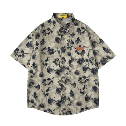 Floral Print Short Sleeve Shirt – Loose Fit with retro floral design in beige and blue tones on a short-sleeve silhouette.