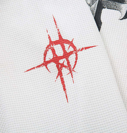 Close-up of a Casual Loose Waffle Knit Top featuring playful cartoon print and red design elements.