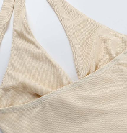 Close-up of the Split Neck Suspender Top – Slim Fit in light beige, showcasing its sleek design and fabric texture.