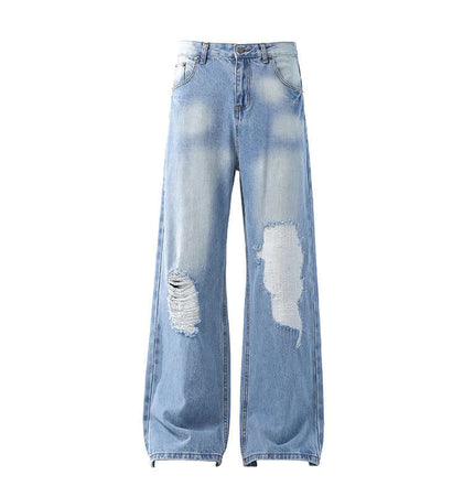 Casual Ripped Light Blue Jeans – Loose Fit featuring a vintage washed finish and ripped detailing for modern street style.