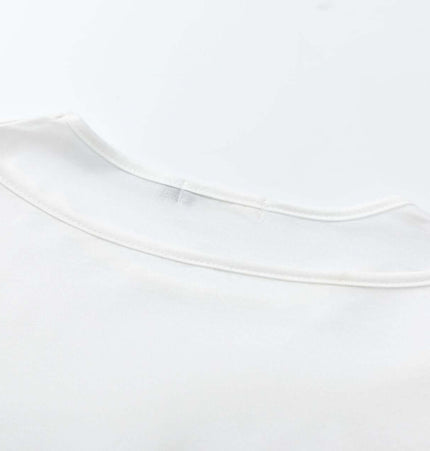 Fitted Long Sleeve Deconstructed TShirt showing the back neckline detail of a vintage style shirt.