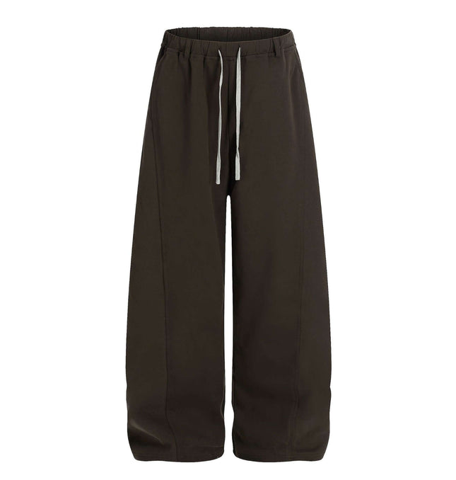 Solid Knife Pants - Loose Fit in dark color with adjustable drawstring and wide-leg design for relaxed comfort.