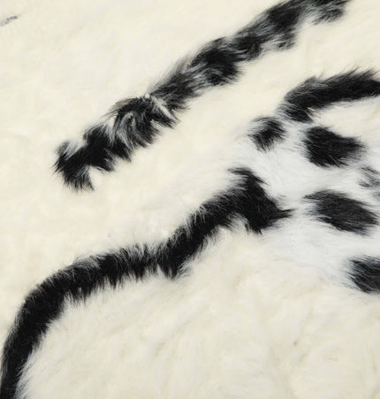 Regular Fit Animal Print Fleece Sweater close-up showing plush fleece texture and bold animal print design.