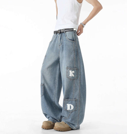 Knife-Cut Cargo Pants – Loose Fit showcasing a loose, distressed denim style with unique pocket detailing.