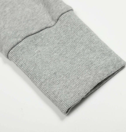 Washed Retro Zip Hooded Jacket – Fitted sleeve detail showcasing soft grey cotton fabric and ribbed cuff design.