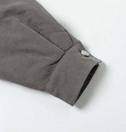 Workwear Cotton Jacket - Loose Fit sleeve detail featuring button and soft fabric texture.