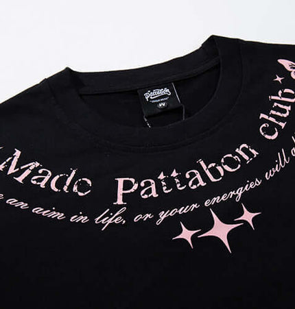 Butterfly Print TShirt – Loose Fit featuring a playful butterfly graphic and stylish text on a black background.