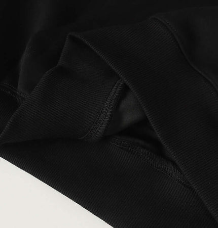 Detail of the Grozavu Men’s Casual Pullover Sports Hoodie - Relaxed Fit, showcasing soft black fabric and stitching.