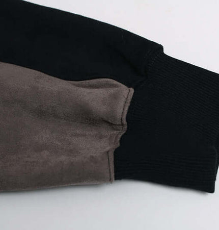 Patchwork High Neck Hoodie – Loose Fit sleeve detail showcasing diverse fabric textures and colors.