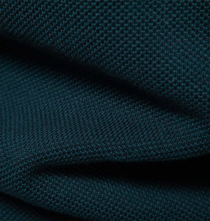 Close-up of the fabric used in the Stand Collar Half-Zip Knit Sweater showcasing its texture and quality.