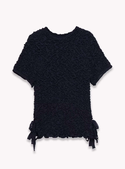 Model wearing Black texture knitted bow round top by Grozavu