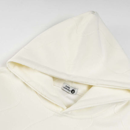 Embroidered Letter Hoodie – Loose Fit with a soft beige hood detail.
