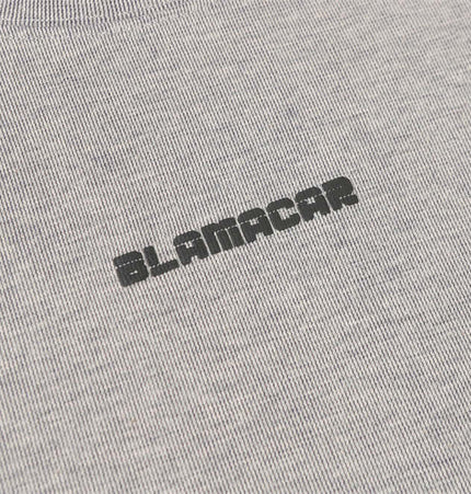 Distressed Short Sleeve TShirt – Loose Fit featuring raw cut detailing and bold letter graphics on a breathable fabric.