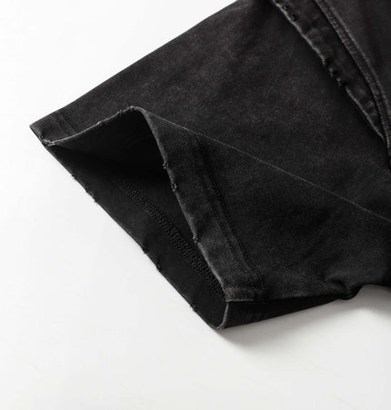 Washed Spliced Distressed TShirt – Loose Fit sleeve detail showcasing black fabric and distressed edges.