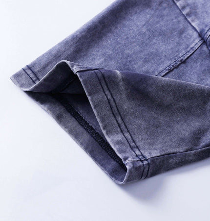 Close-up of the sleeve hem of the Retro Tie-Dye Spliced TShirt – Loose Fit in a washed color design.