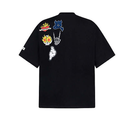 Cartoon Badge Cotton TShirt – Loose Fit featuring playful graphics and a relaxed fit for summer leisure wear.