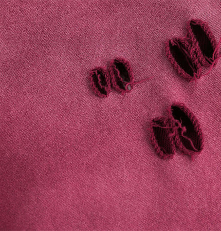 Close-up of broken hole details on the Tie-Dye Gradient Half-Zip Hoodie – Loose Fit fabric.