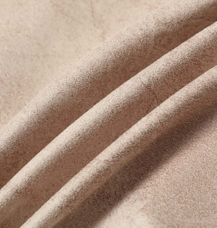 Close-up of soft beige fabric showcasing texture for the Faux Fur Hooded Jacket – Street Style.