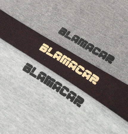 Distressed Short Sleeve TShirt – Loose Fit showing the letter graphics design from the Grozavu collection.