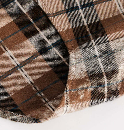 Close-up of the fabric pattern on the Checkered Hooded Plaid Shirt – Loose Fit, showcasing its brown and black plaid design.
