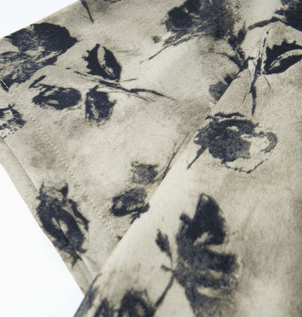 Floral Print Short Sleeve Shirt – Loose Fit fabric with vintage floral design in muted tones.