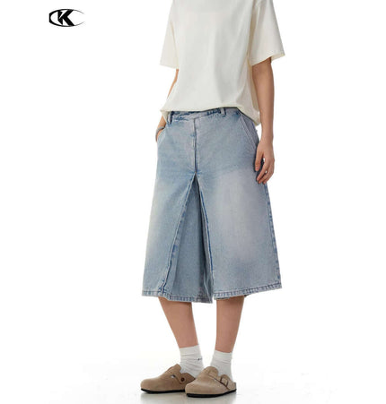 Washed Blue Denim Shorts – Loose Fit on a model showcasing a relaxed street style aesthetic.