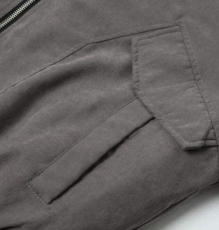 Close-up of the Grozavu Workwear Cotton Jacket - Loose Fit showcasing pocket detail and fabric texture.