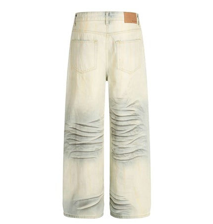 Back view of Vintage Cat-Scratch Denim Pants showcasing the unique whisker wash effect and relaxed fit.