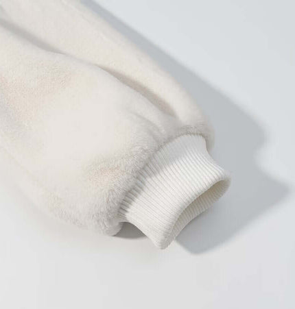 Close-up of the sleeve cuff of a Faux Fur Hooded Winter Coat in soft cream color, showcasing cozy texture and ribbed detailing.