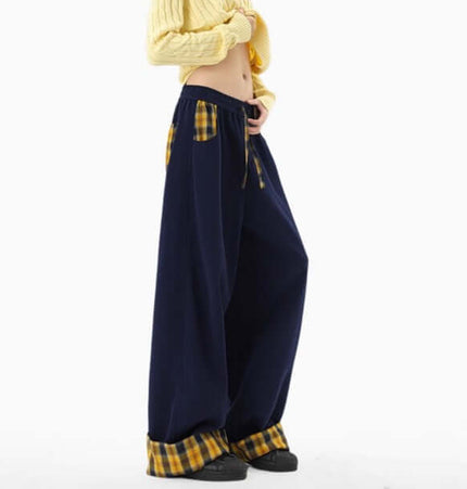 Loose Wide-Leg Sweatpants in navy with plaid accents, featuring a relaxed fit and mid-waist adjustable drawstring.