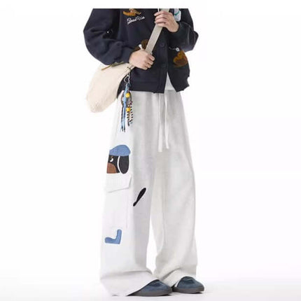Dog Embroidered Sweatpants - Loose Fit featuring playful dog design and wide-leg silhouette.