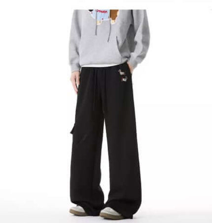 Embroidered Dog Sweatpants – Loose Fit displayed with a cozy hoodie, showcasing dog embroidery and retro streetwear style.