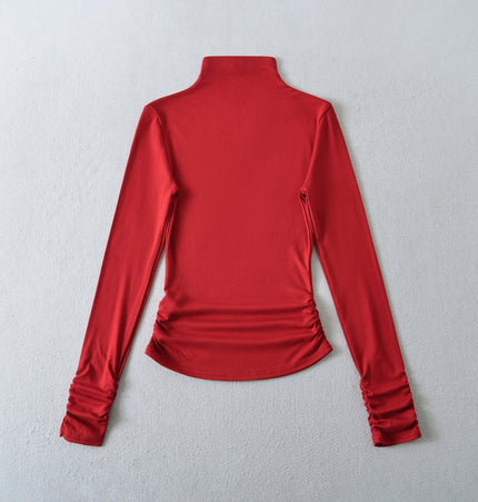 Back view of the Grozavu Women SculptFit High-Neck Long Sleeve Top in vibrant red, showcasing its sleek design and figure-flattering fit.