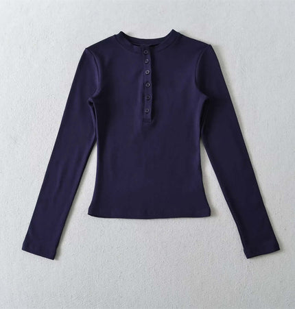 Top de manga larga con media botonera elástica