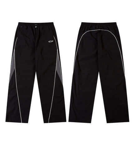 Outdoor Casual Retro Patchwork Pants in black with contrast white piping and elastic waistband.