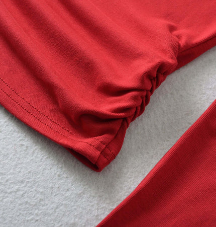 SculptFit High-Neck Long Sleeve Top detail showcasing the soft red fabric and stylish design.