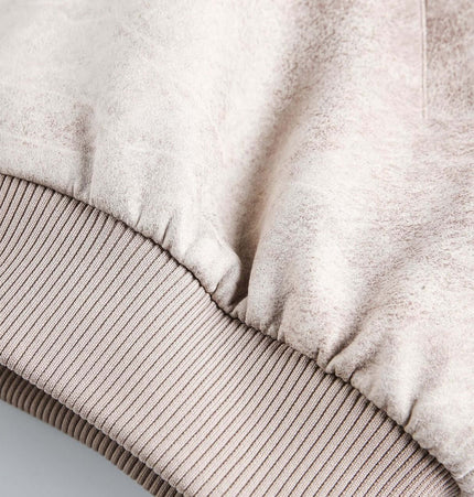 Close-up of sleeve cuff detailing on the Crack Pattern Leather Jacket – Loose Fit in Apricot color.