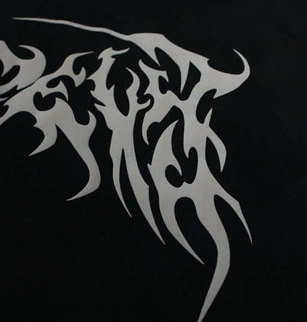 Stylish letter print detail from the Patchwork High Neck Hoodie – Loose Fit on a black background.