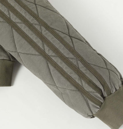 Casual Distressed Zipper Hoodie – Loose Fit showcasing quilted sleeve design and three-stripe details.