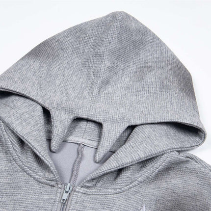 Distressed Letter Zip Hoodie - Loose Fit hood detail featuring gray fabric and embroidered letter design.