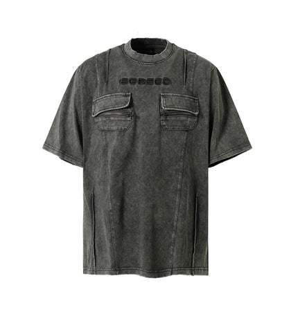 Retro Pocket Embroidery TShirt – Loose Fit in washed black with front pockets and embroidered detail.