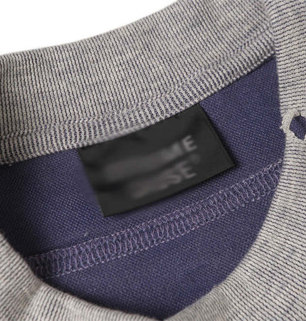 Distressed Short Sleeve TShirt – Loose Fit showing destruction-inspired patchwork and ripped detailing for edgy summer style.